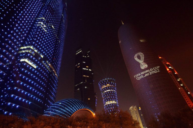 The-tournaments-official-logo-for-the-2022-Qatar-World-Cup-is-seen-on-the-Doha-Tower-in-Doha-scaled-e1653286140773.jpeg